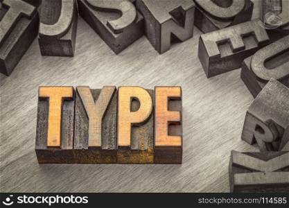 type word abstract in vintage letterpress wood type printing blocks, color combined with black and white image