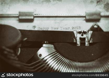 Typewriter with the phrase, Happy New Year 2018
