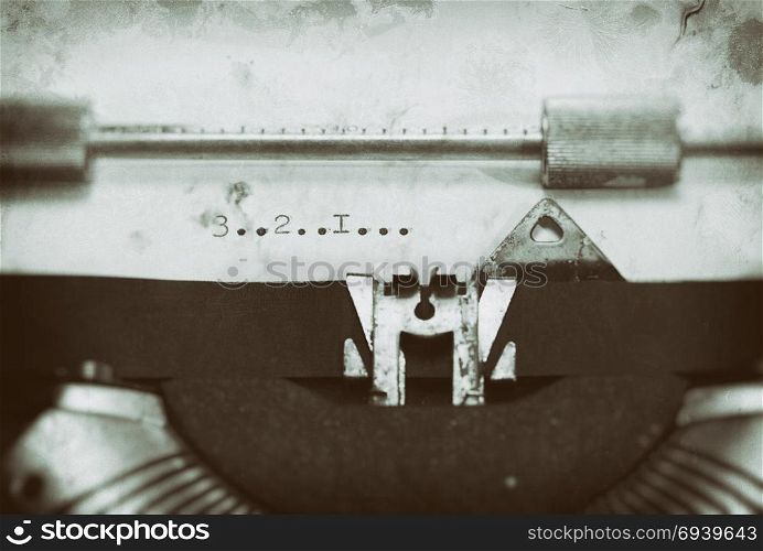 Typewriter with the phrase, Typewriter with the phrase, 3... 2.... 1....