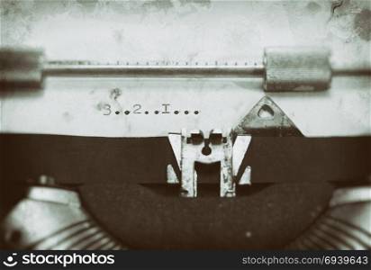Typewriter with the phrase, Typewriter with the phrase, 3... 2.... 1....