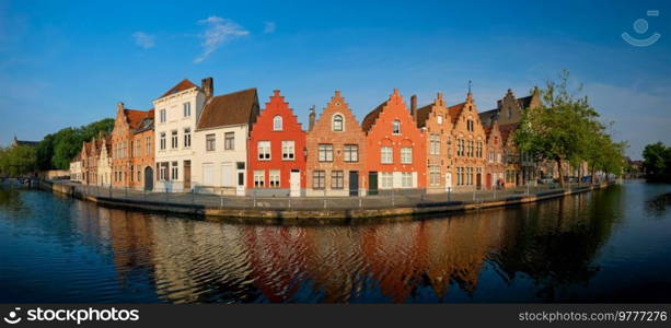 Typical Belgian cityscape Europe tourism concept - panorama of canal and old houses on sunset. Bruges  Brugge , Belgium. Canal and old houses. Bruges Brugge , Belgium