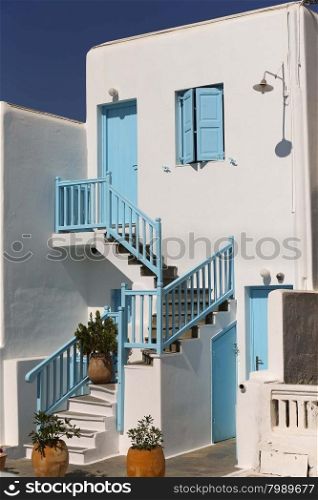 Typical blue door and window from a Greek house