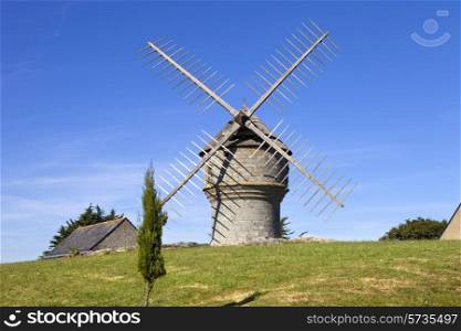 typical brittany windmill in the north of france