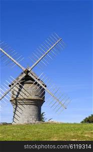 typical brittany windmill in the north of france