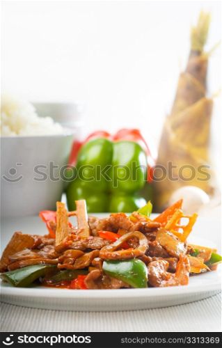 typical chinese dish,fresh beef stir fried with pepperrs bamboo sprout and mushrooms