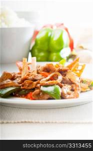 typical chinese dish,fresh beef stir fried with pepperrs bamboo sprout and mushrooms