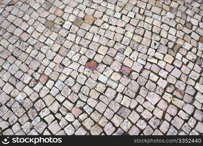 Typical cobblestoned street in Portugal suitable as a background.