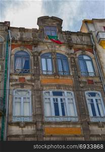 Typical Colorful Portuguese Architecture: Tile Azulejos Facade with Antique Windows And Balcony - Portugal. Typical Colorful Portuguese Architecture: Tile Azulejos Facade w