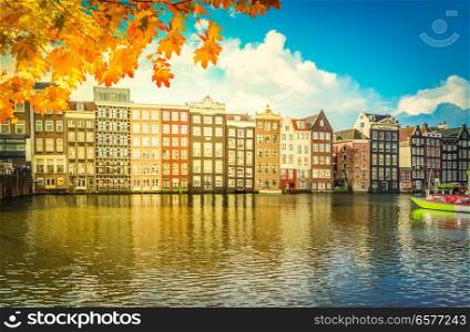 Typical dutch old houses over fall canal, Amsterdam, Netherlands. Houses of Amstardam, Netherlands