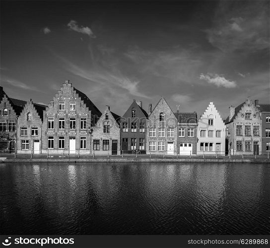 Typical European Europe cityscape view - canal and medieval houses. Bruges Brugge, Belgium. Black and white version
