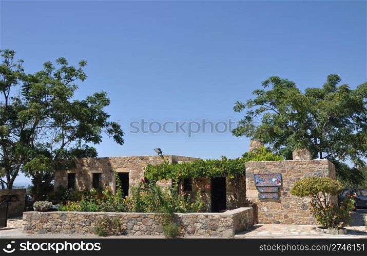 typical greek stone house with lovely garden in Antimahia (Kos), Greece