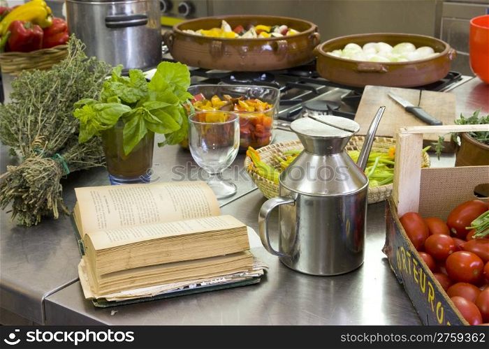 Typical italian cuisine ingredients as oil, oregano and tomatoes