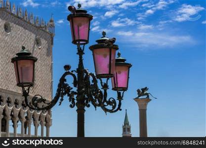 Typical lamp, Doge&rsquo;s Palace, San Giorgio Maggiore Bell Tower and Winged Lion Column in Venice - Italy