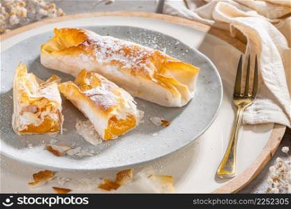 Typical portuguese sweets Pasteis de Vouzela served on countertop. Filo pastry with egg cream filling