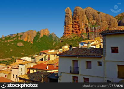Typical Spanish Medieval City on the Background of Rocky Mountains