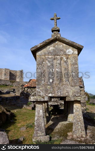 Typical stone corn driers, called Espigueiros in Lindoso, north of Portugal.