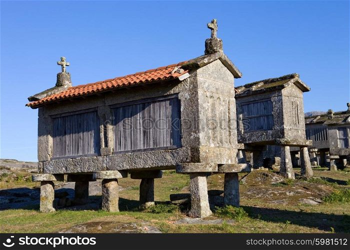 Typical stone corn driers, called Espigueiros in Lindoso, north of Portugal.