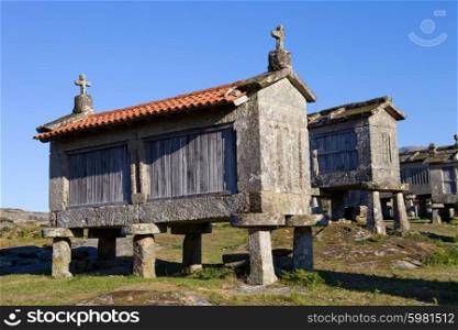 Typical stone corn driers, called Espigueiros in Lindoso, north of Portugal.