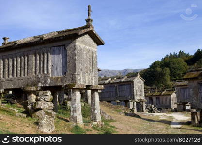 Typical stone corn driers, called Espigueiros in Lindoso, north of Portugal.