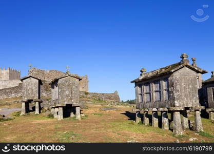 Typical stone corn driers, called Espigueiros in Lindoso, north of Portugal.