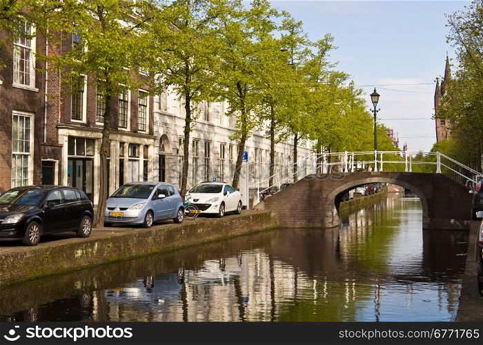 Typical street scene and canal in the city of Delft, Netherlands