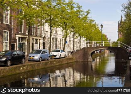 Typical street scene and canal in the city of Delft, Netherlands