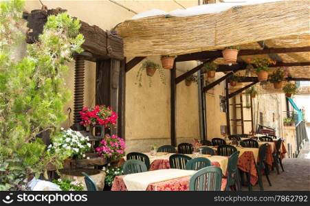 typical summer restaurant with outdoor courtyard for intimate romantic encounters