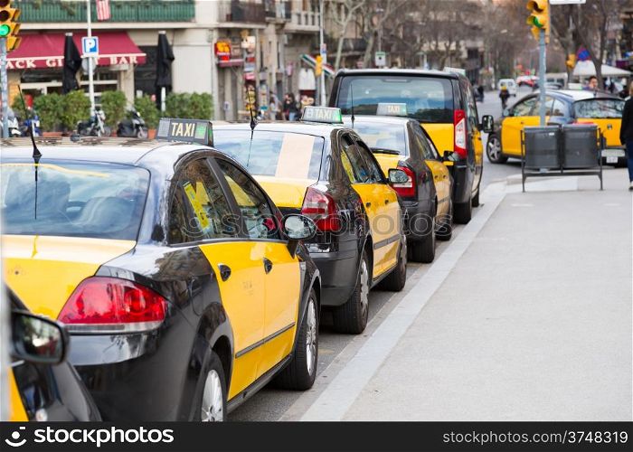 Typical taxi yellow and black of Barcelona