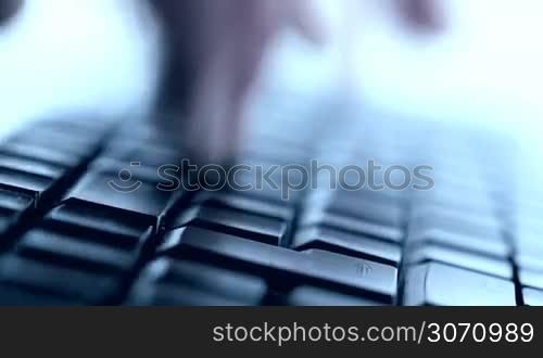 Typing on keyboard close-up view