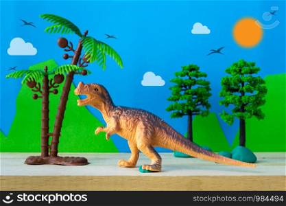 Tyrannosaurus dinosaur toy model on wild models background