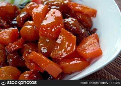tzimmes - traditional Ashkenazi Jewish sweet stew .made from carrots and dried fruits such as prunes or raisins