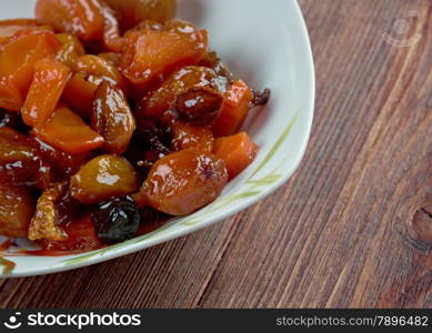 tzimmes - traditional Ashkenazi Jewish sweet stew .made from carrots and dried fruits such as prunes or raisins