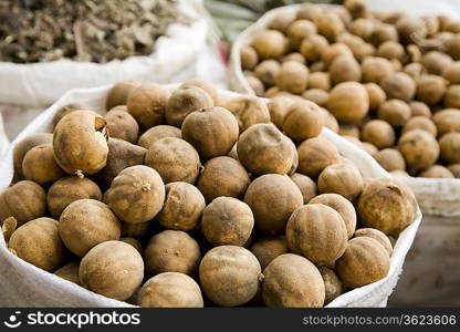 UAE, Dubai, dried lemons and other spices for sale in the spice souq in Deira