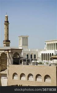 UAE, Dubai, old windtowers and minaret of the Grand Mosque in Bur Dubai