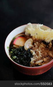 Udon noodles with fried shrimp tempura Japanese food