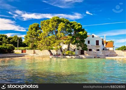 Ugljan village idyllic island beach and old architecture, Dalmatia, Croatia