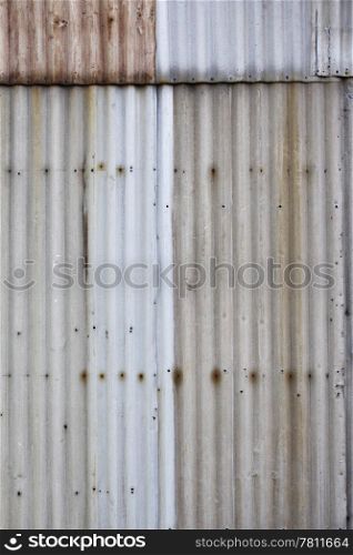 Ugly corrugated iron metal background texture.