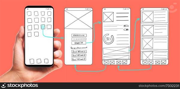 UI development. Male hand holding smartphone with wireframed user interface screen prototypes of a mobile application on living coral background.. Developing mobile app UI