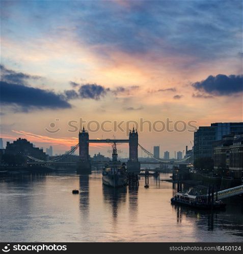 UK. Stunning Autumn sunrise over Tower Bridge and River Thames in London