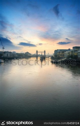 UK. Stunning Autumn sunrise over Tower Bridge and River Thames in London