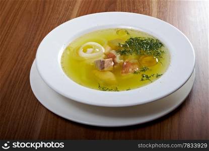 Ukha with sterlet , salmon . Russian homemade traditional fish soup.