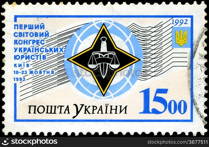 UKRAINE - CIRCA 1992: A Stamp printed in the UKRAINE shows the arms of Ukraine, first Congress of Ukrainian Lawyers, circa 1992