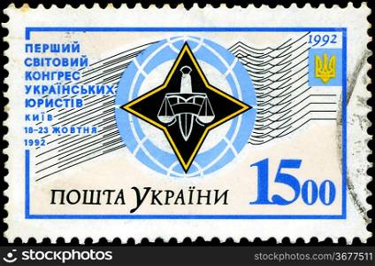UKRAINE - CIRCA 1992: A Stamp printed in the UKRAINE shows the arms of Ukraine, first Congress of Ukrainian Lawyers, circa 1992