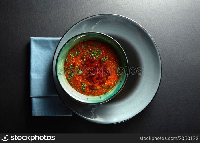 Ukrainian and russian national red soup borsch on black background. Ukrainian and russian national red soup