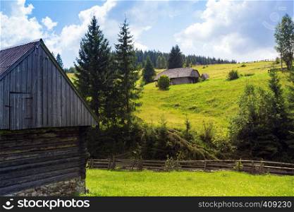 Ukrainian landscape. view of the wooden houses and mountains in Carpathians, Ukraine