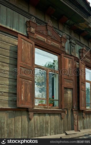 Ulan-Ude city. Carving on the window frames in old wooden house Russia. July 25, 2016