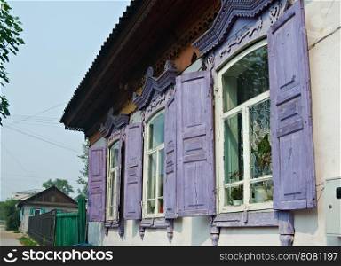 Ulan-Ude city. Carving on the window frames in old wooden house Russia. July 25, 2016