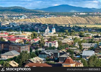 Ulan-Ude, Russia - July 20, 2022: Panoramic view from the height of the city in summer on a bright sunny day. Ulan-Ude, Russia - July 20, 2022: Panoramic view from the height of the city in summer on a bright sunny day.