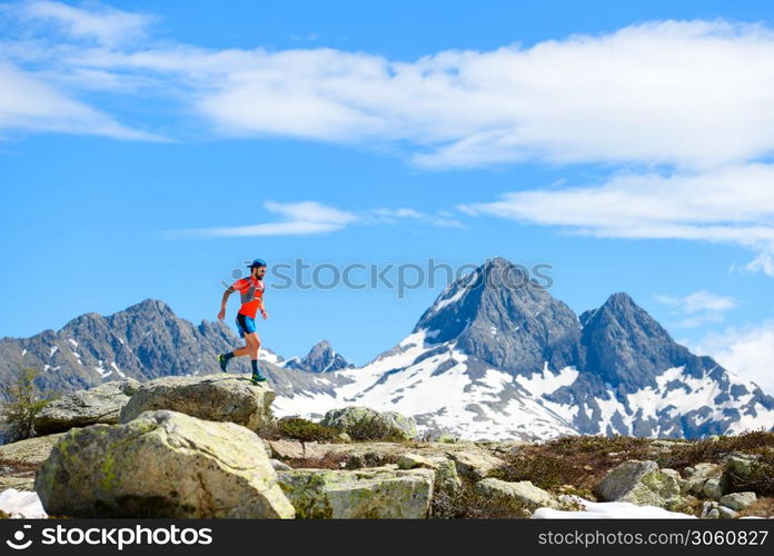 Ultra mountain trail athlete in action during training