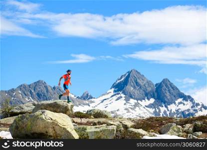 Ultra mountain trail athlete in action during training